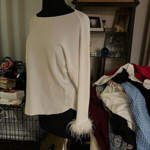 Elegant White Top with Feather Cuffs